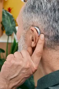 man testing hearing aids