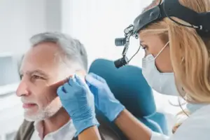 Professional ear wax removal by audiologist.